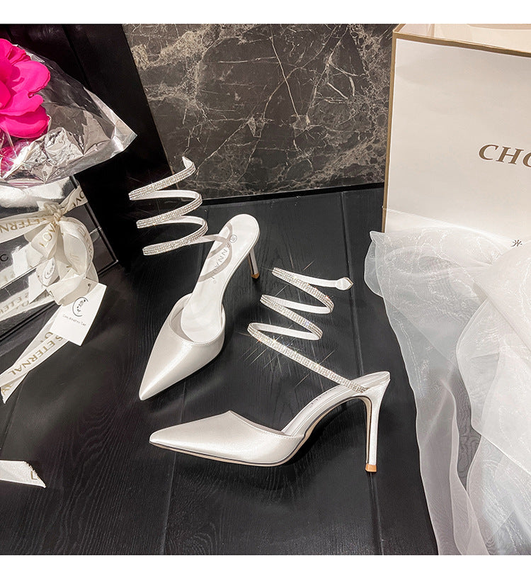 Stiletto heeled rhinestone strap pumps