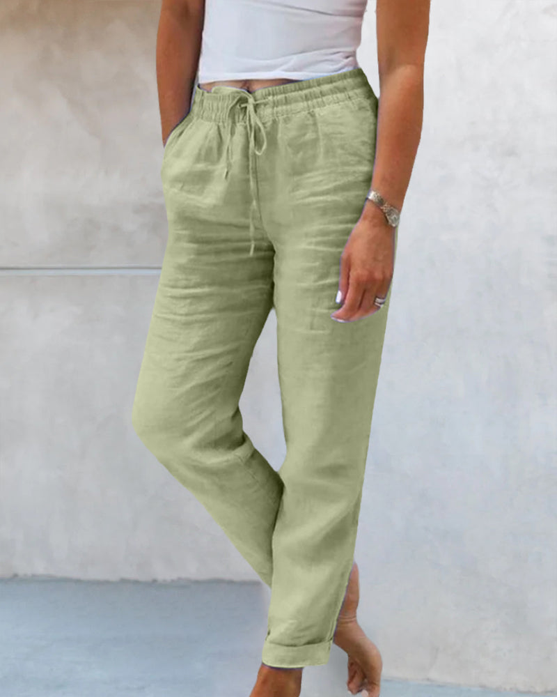 Pantalon en lin vert clair pour femme, taille élastique avec cordon, poches latérales, style décontracté, idéal pour l'été et les tenues décontractées.