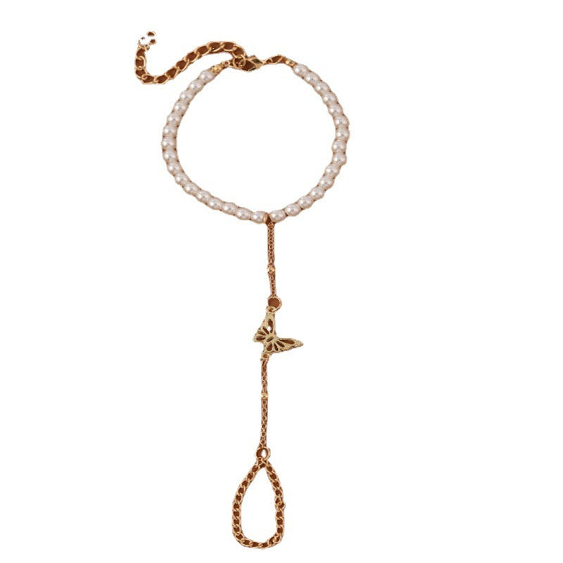 Bracelet en perle avec pendentif papillon