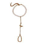 Bracelet en perle avec pendentif papillon