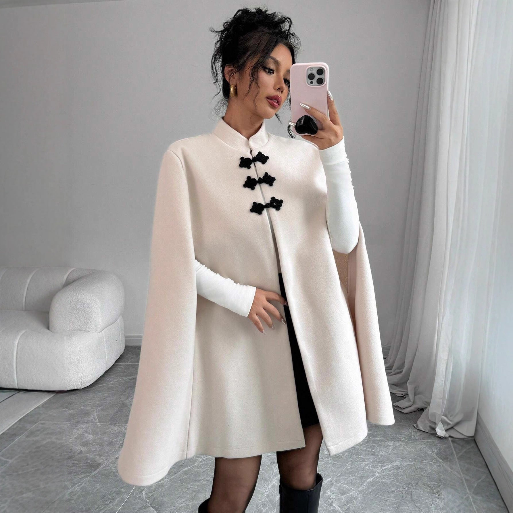 Stylish wool coat with frog fastenings