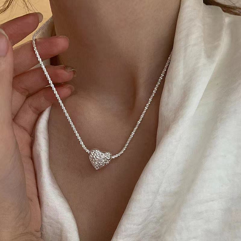 Necklace with heart pendant