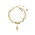 Chinese beaded bracelet with leaf pendant