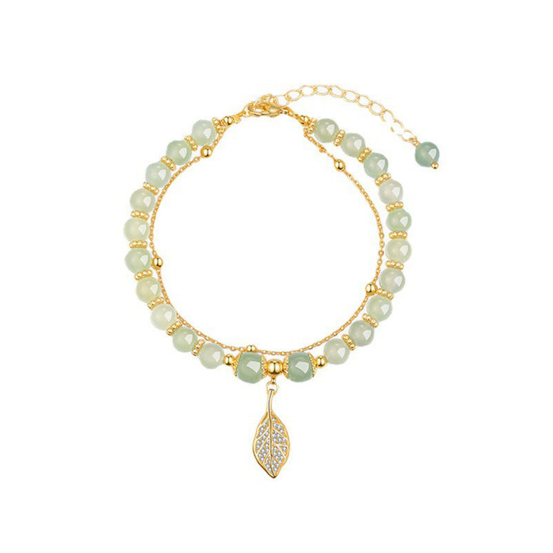 Chinese beaded bracelet with leaf pendant