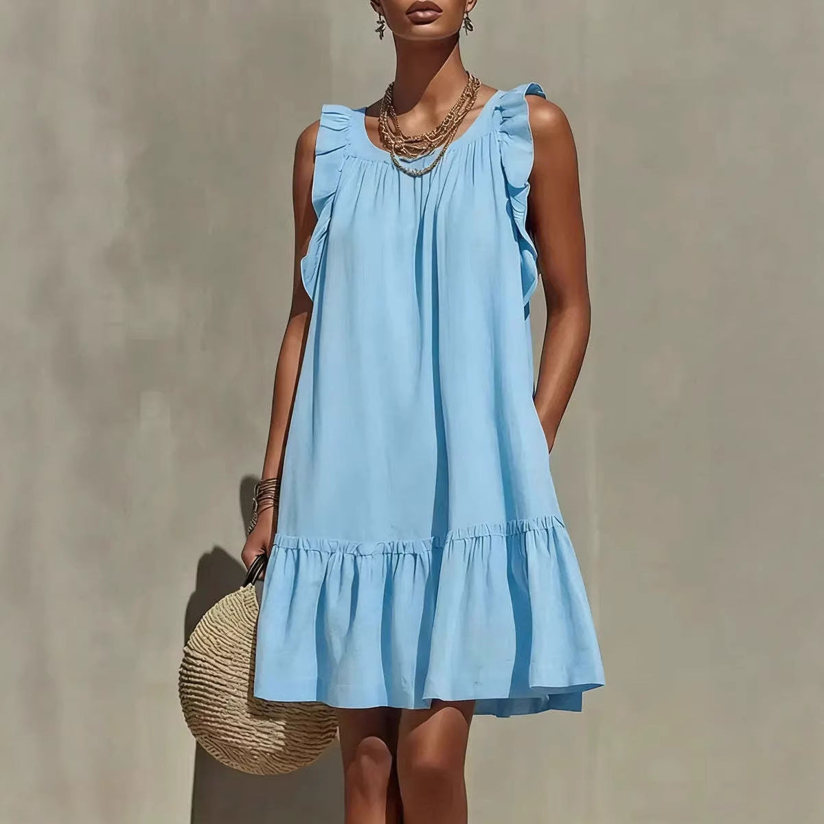 Robe droite sans manches, col rond et volants