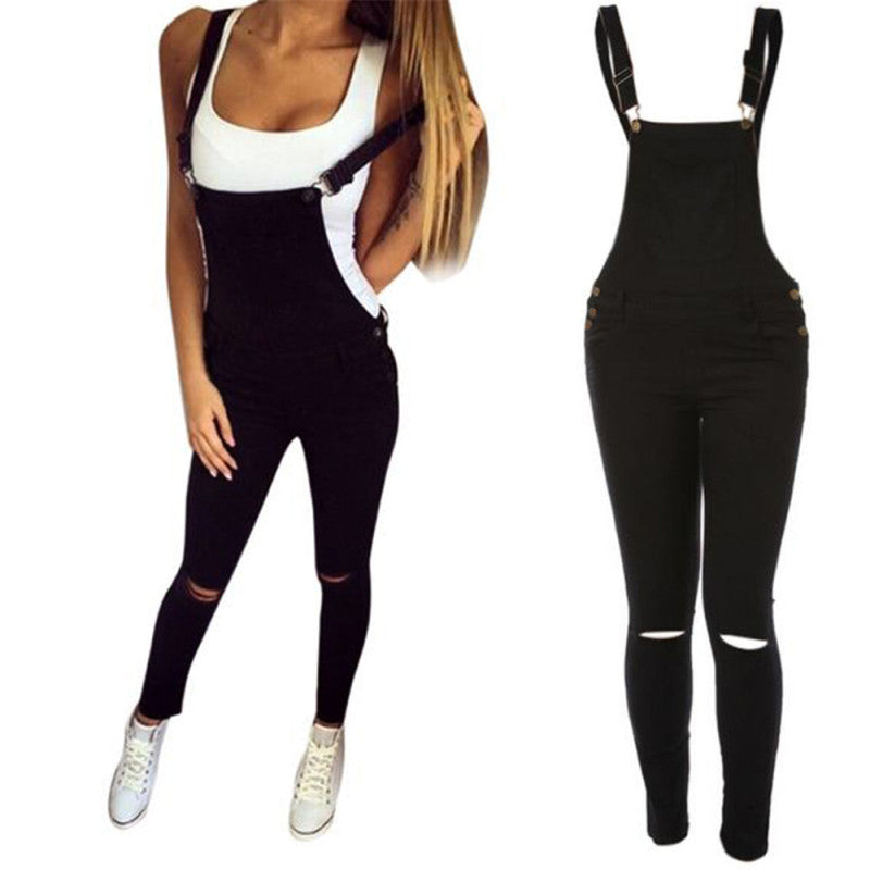 Salopette jeans moulant bretelle réglable déchiré