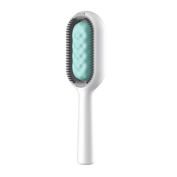 Brosse à cheveux blanche avec coussin bleu, design moderne, idéale pour démêler et lisser les cheveux. Accessoire de coiffure essentiel.