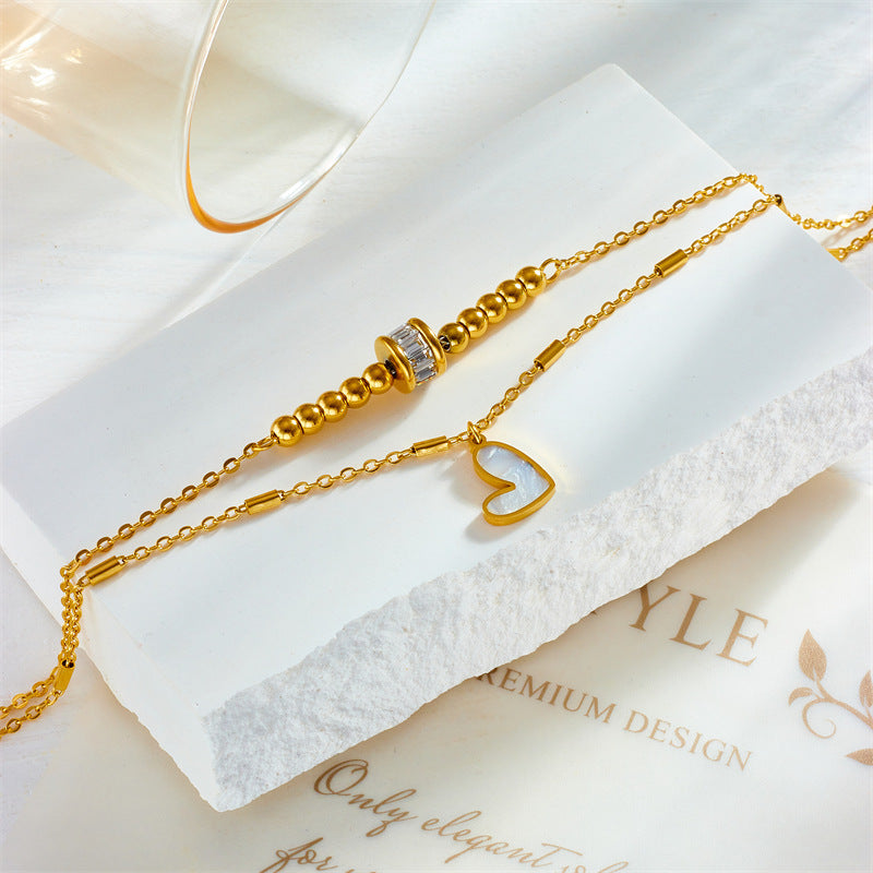 Chaîne double de cheville pendentif cœur