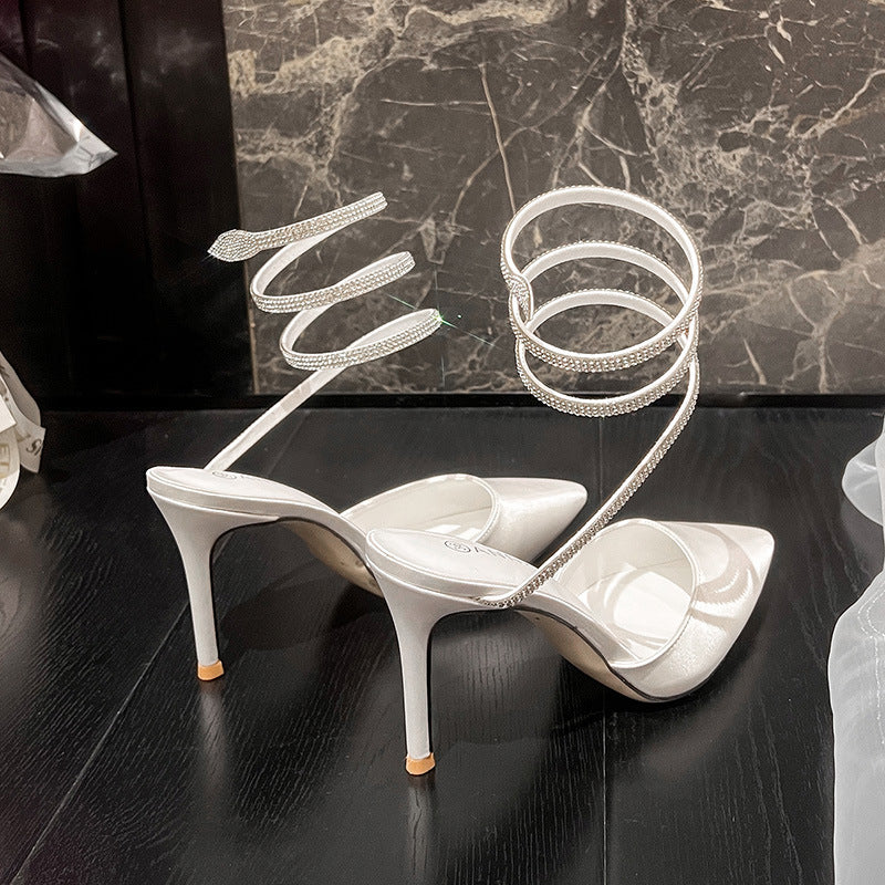 Stiletto heeled rhinestone strap pumps