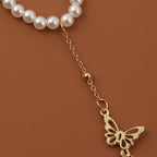 Bracelet en perle avec pendentif papillon