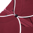 Robe courte rétro à col montant et coupe ajustée