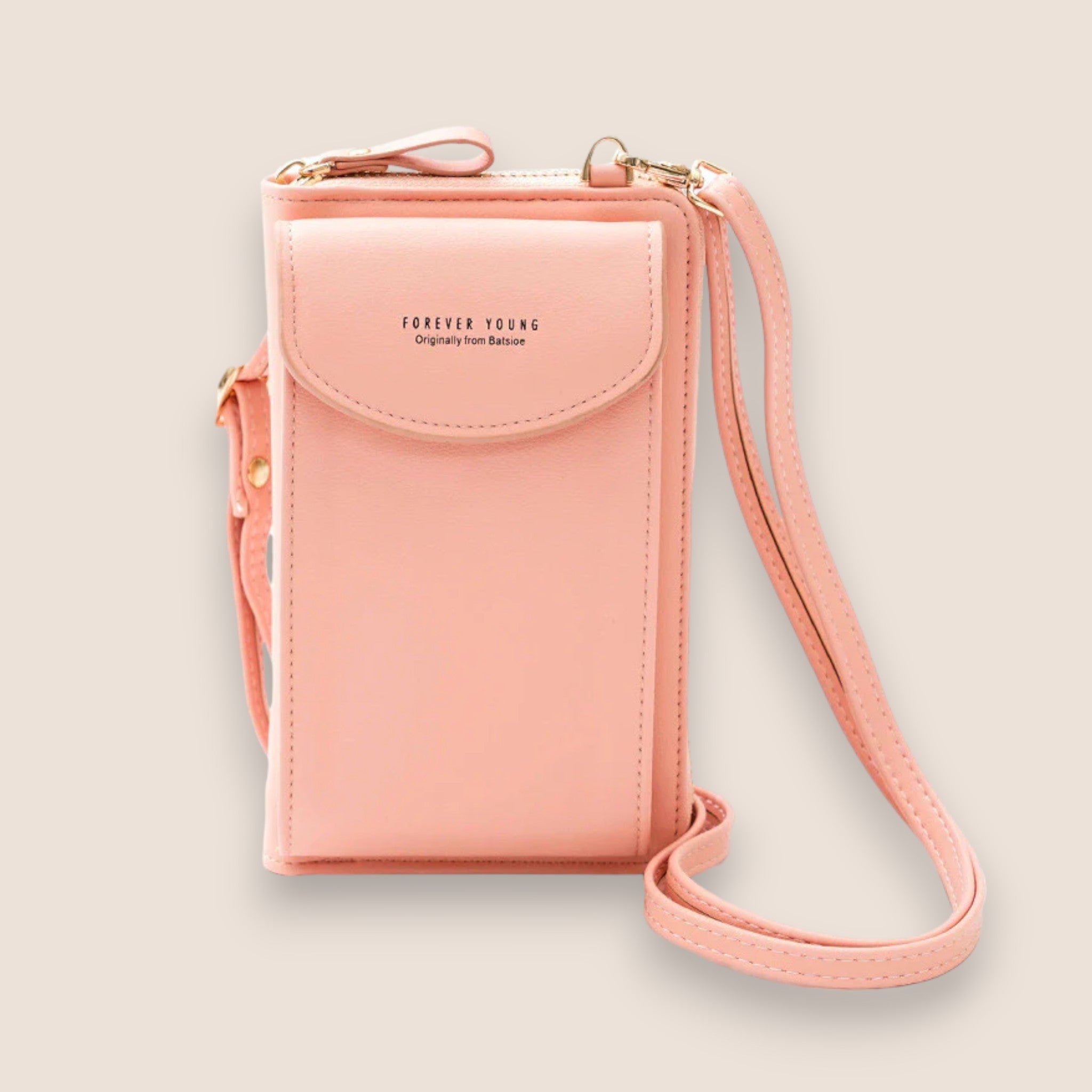 Sac à bandoulière rose en cuir synthétique, design compact avec fermeture à rabat, idéal pour smartphone et accessoires. Mode féminine élégante.