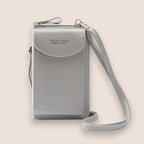 Sac à bandoulière gris élégant pour femme, design moderne, cuir synthétique, idéal pour smartphone, avec fermeture à rabat et sangle ajustable.