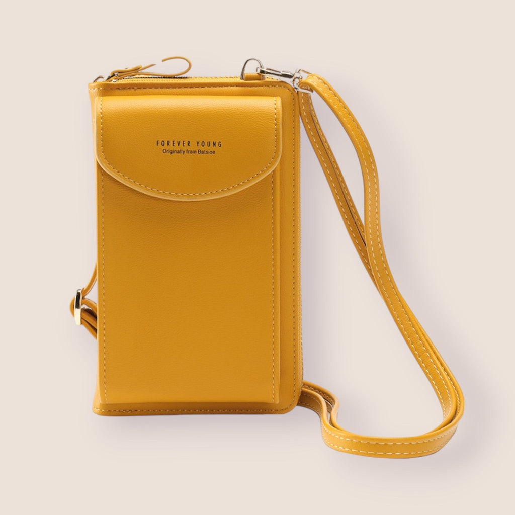 Sac à bandoulière jaune en cuir, design moderne, avec rabat et sangle ajustable. Accessoire mode tendance pour femmes, idéal pour sorties urbaines.