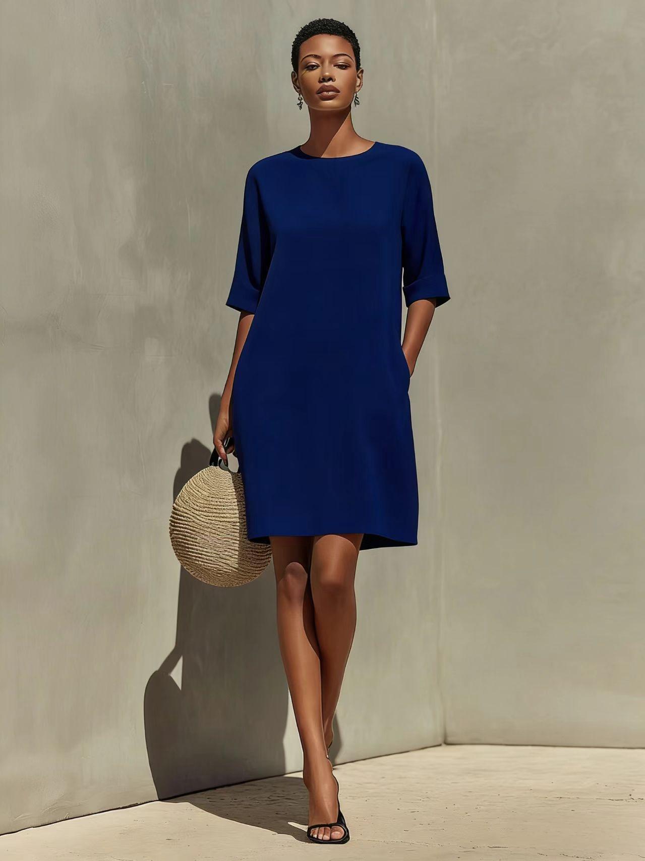 Robe col rond à manches retroussées