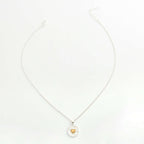 Collier pendentif cœur incrusté au milieu