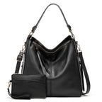 Sac à main en cuir noir élégant avec bandoulière amovible et pochette assortie. Design moderne, idéal pour la mode féminine et le quotidien.