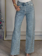 Jean glamour taille haute à jambes larges et brillance subtile