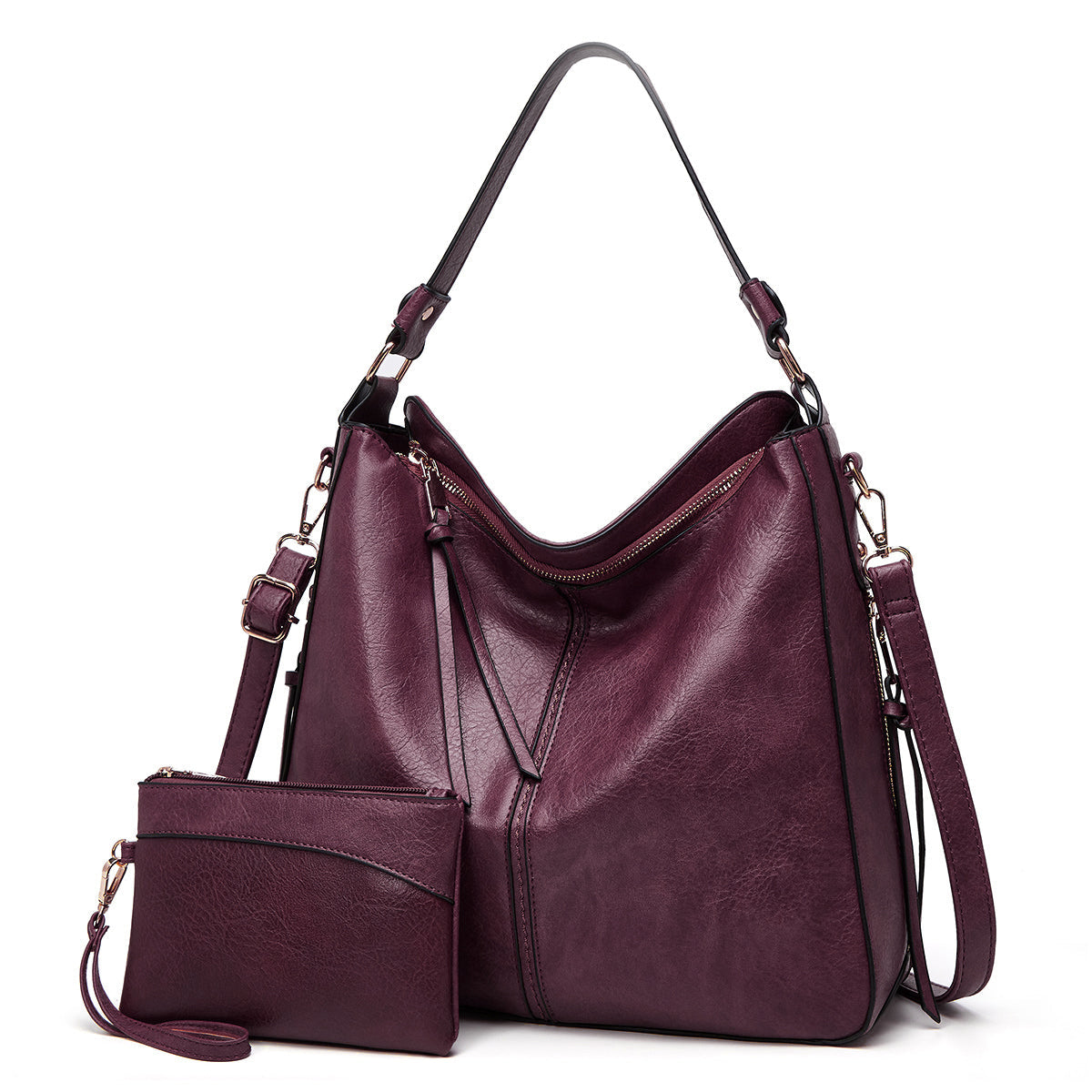 Sac à main en cuir violet avec pochette assortie, bandoulière réglable, design élégant et moderne, idéal pour femme, mode automne-hiver.