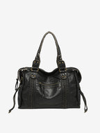 Sac à main en cuir noir élégant avec coutures décoratives, poches zippées et anses robustes. Accessoire mode femme chic et pratique.