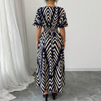 Long dress with short sleeves and fitted waist