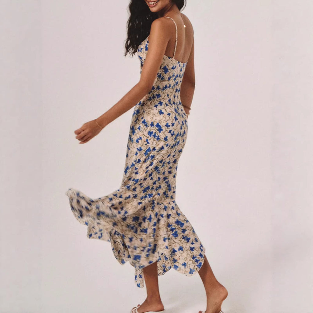 Robe longue fluide à motifs floraux et ceinture cintrante