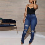 Jean slim déchirée taille haute fentes chevilles