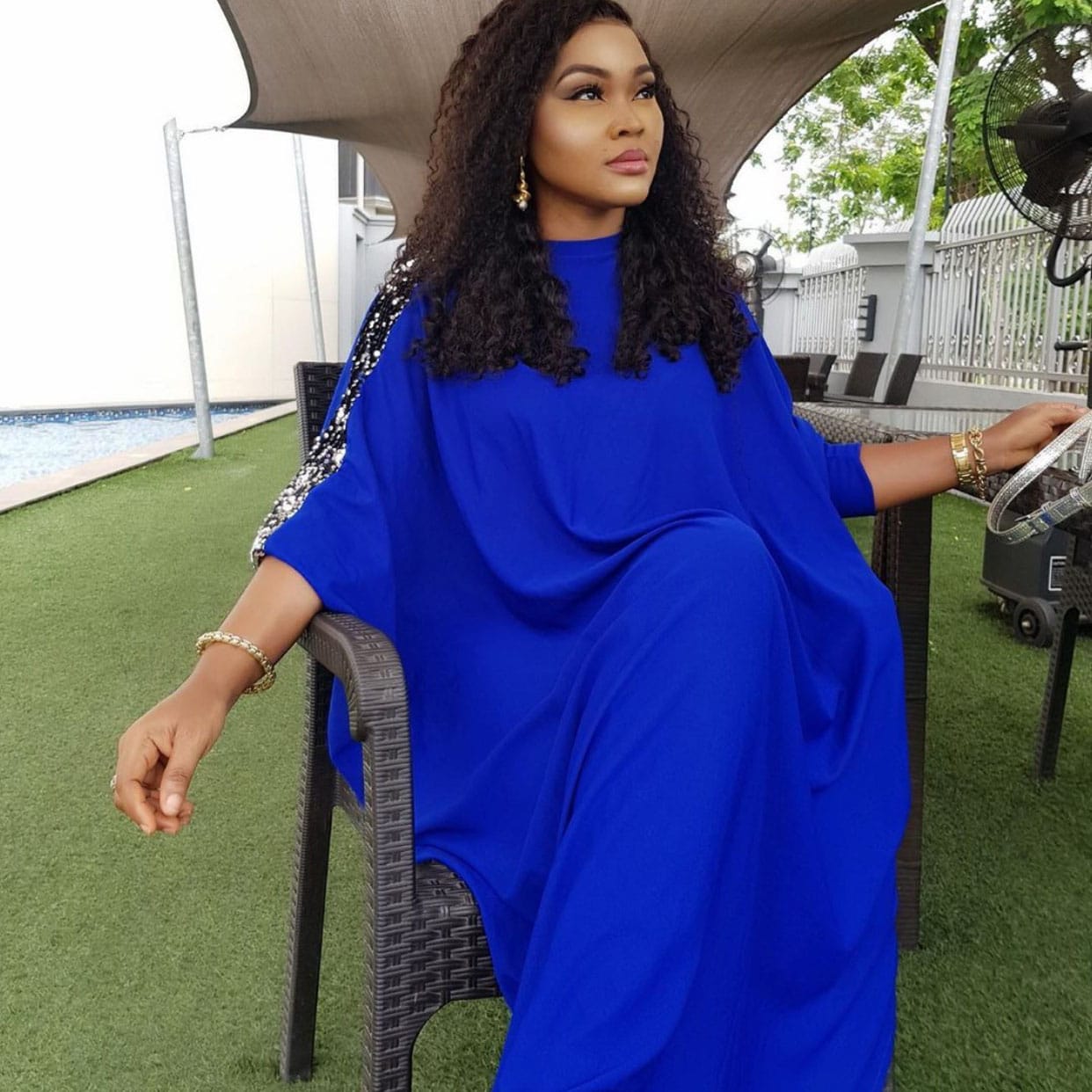 Three-quarter sleeve irregular hem side slit maxi dress