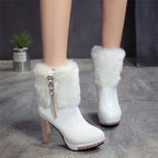High-heeled plush and rhinestone boots