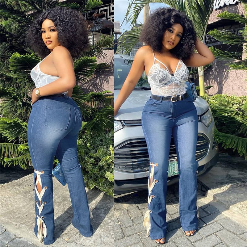 High-waisted jeans with side lacing