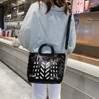 Ensemble sac design découpe avec pochette