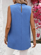 Irregular draped sleeveless top