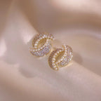 Boucles d'oreilles ornées de strass et de perle