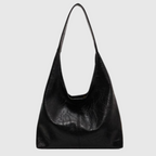 Sac à main noir en cuir texturé, design minimaliste, anse unique, style moderne et élégant, accessoire de mode pour femme.