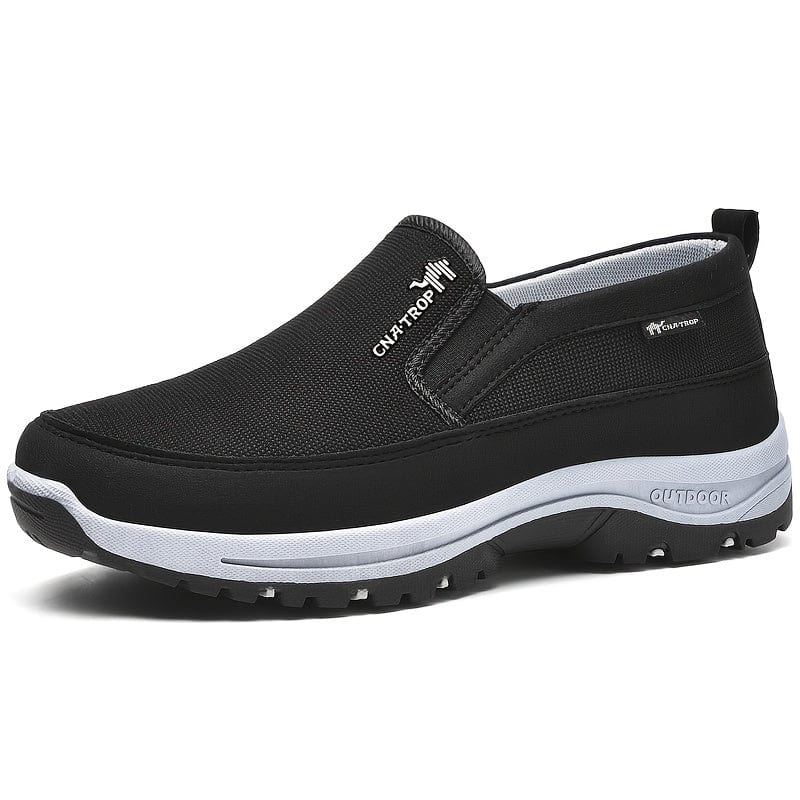Chaussure de marche noire pour homme, semelle antidérapante, design slip-on, idéale pour activités extérieures, confort et style moderne.