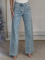 Jean glamour taille haute à jambes larges et brillance subtile