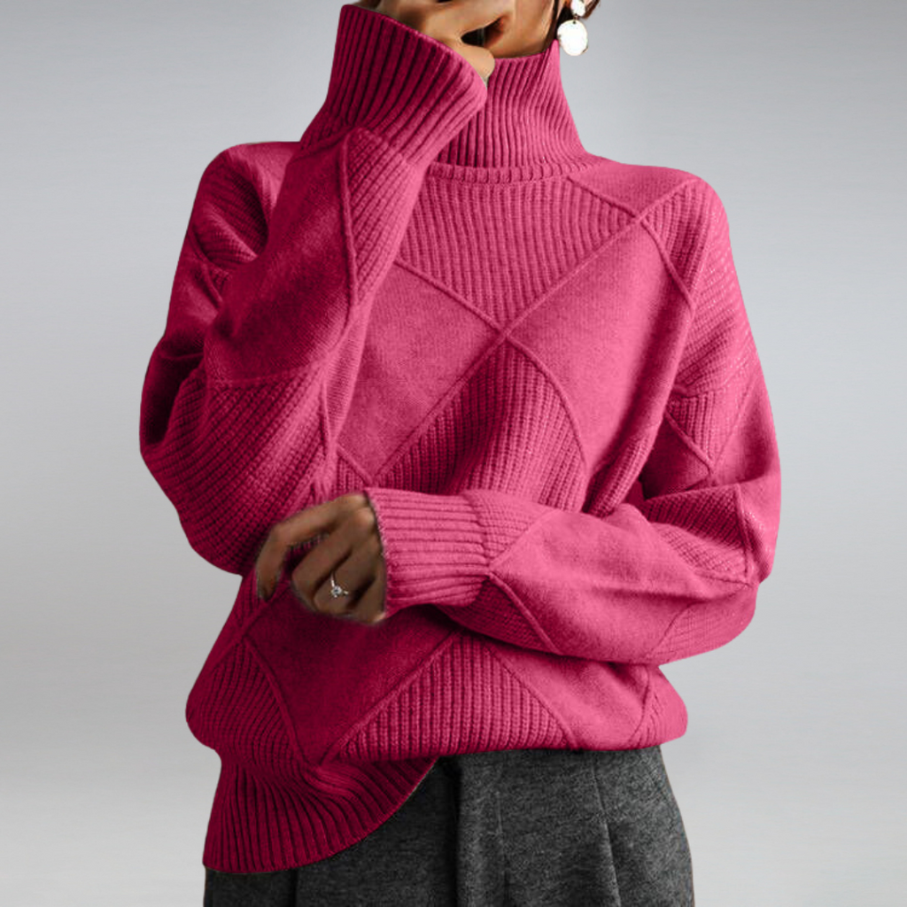 Pull-over rose à col roulé texturé, manches longues, porté par une personne. Style élégant et moderne, idéal pour la mode automne-hiver.