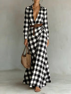 Asymmetrical pleated dress with matching belt