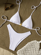 Sofia — White two-piece bikini with ties and metallic finishes