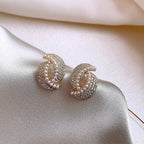 Boucles d'oreilles ornées de strass et de perle