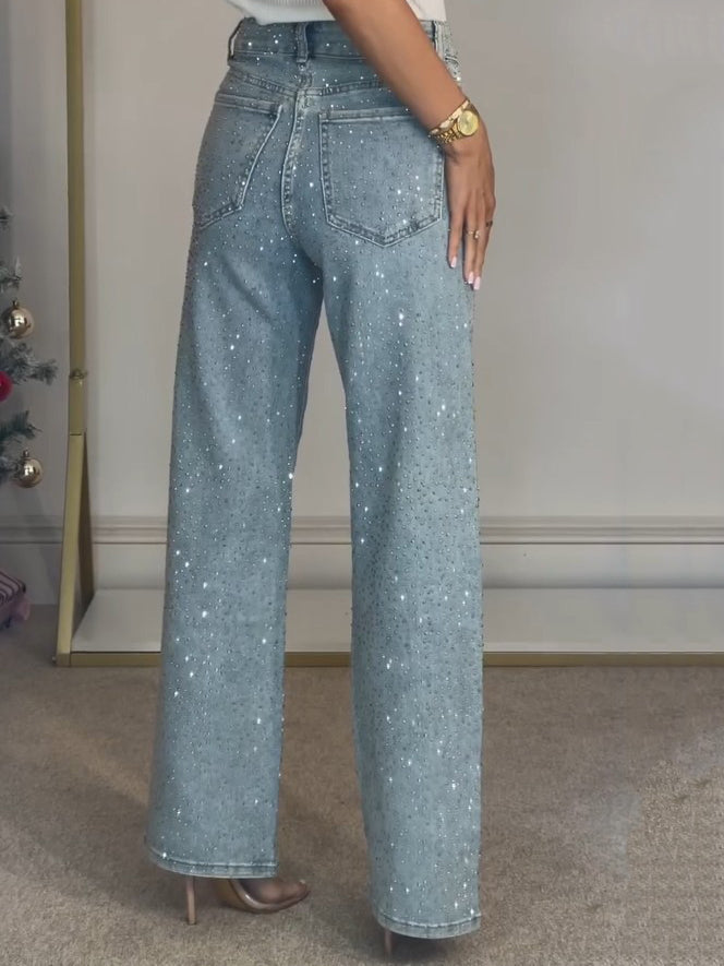 Jean glamour taille haute à jambes larges et brillance subtile