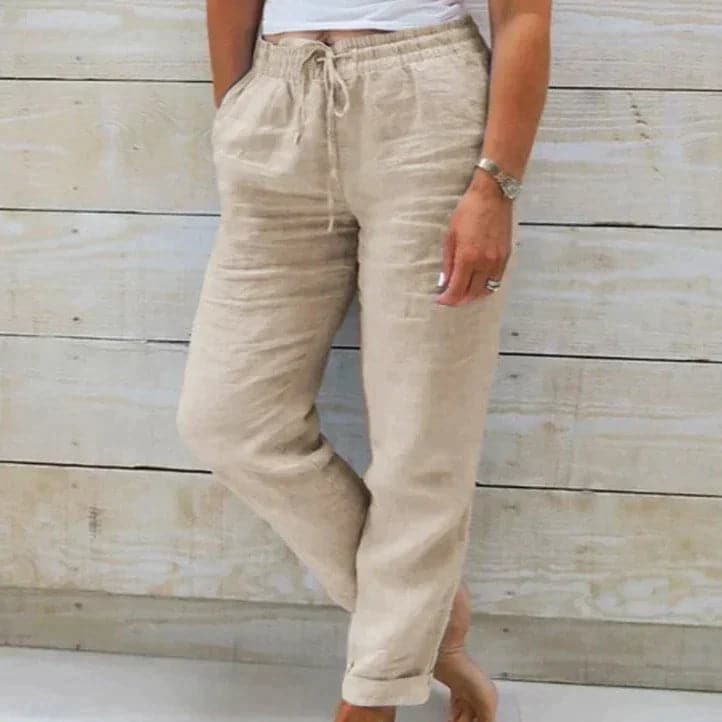 Pantalon en lin beige pour femme, taille élastique avec cordon, poches latérales, style décontracté, idéal pour l'été et les tenues décontractées.