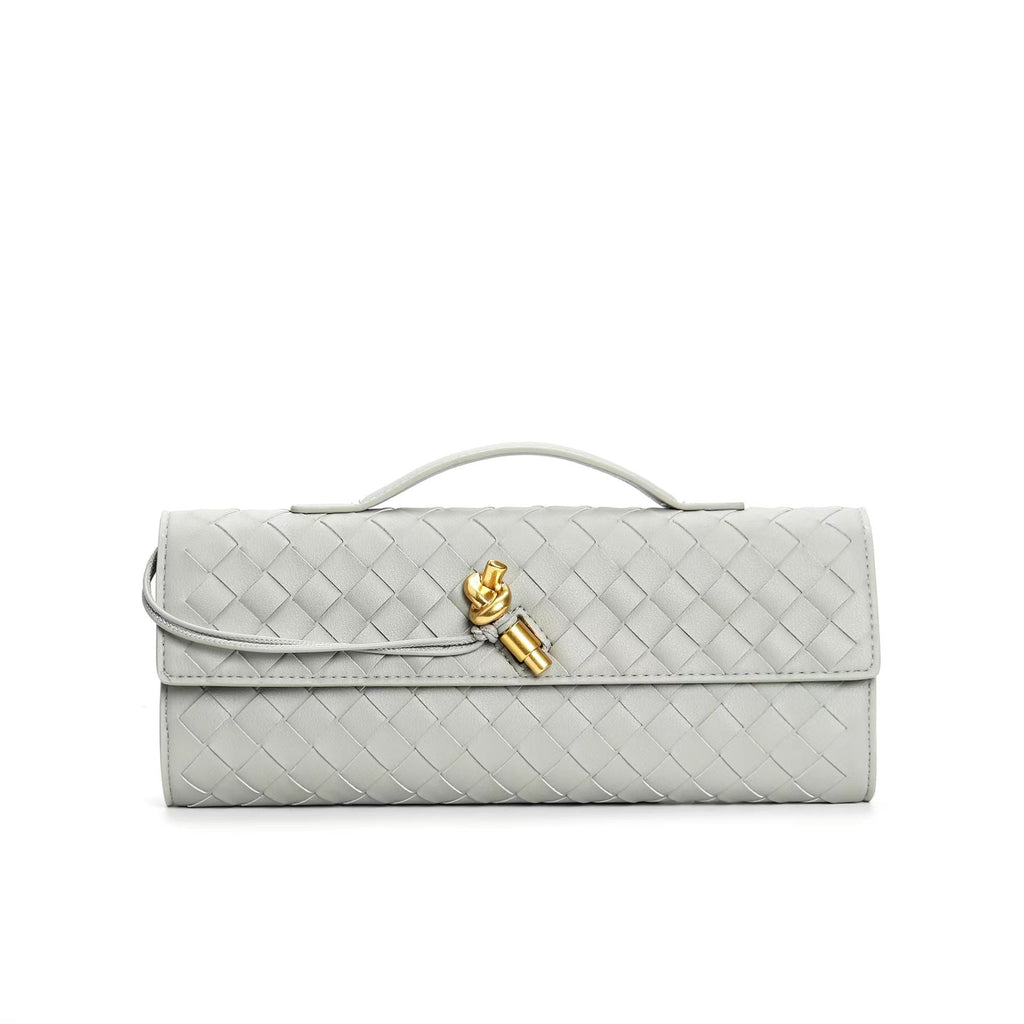Sac à main en cuir tressé gris avec fermoir doré, design élégant et moderne. Accessoire de mode luxueux pour femme, tendance et chic.