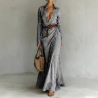 Asymmetrical pleated dress with matching belt