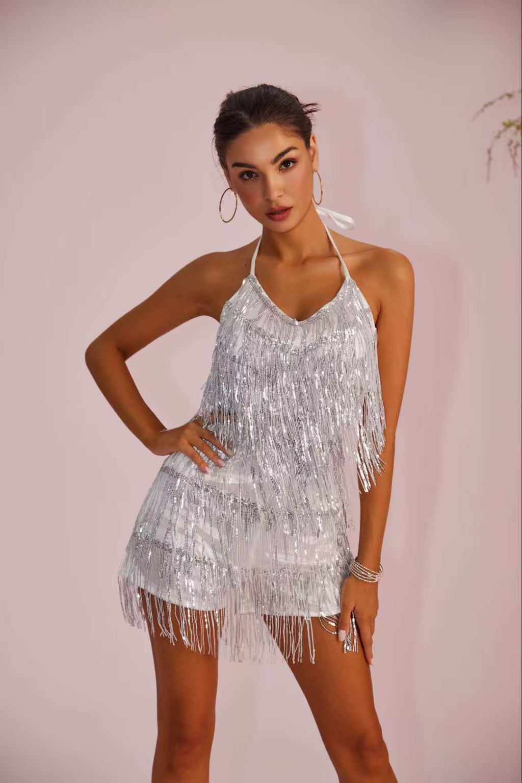 Dress with shimmering sequins and fringes