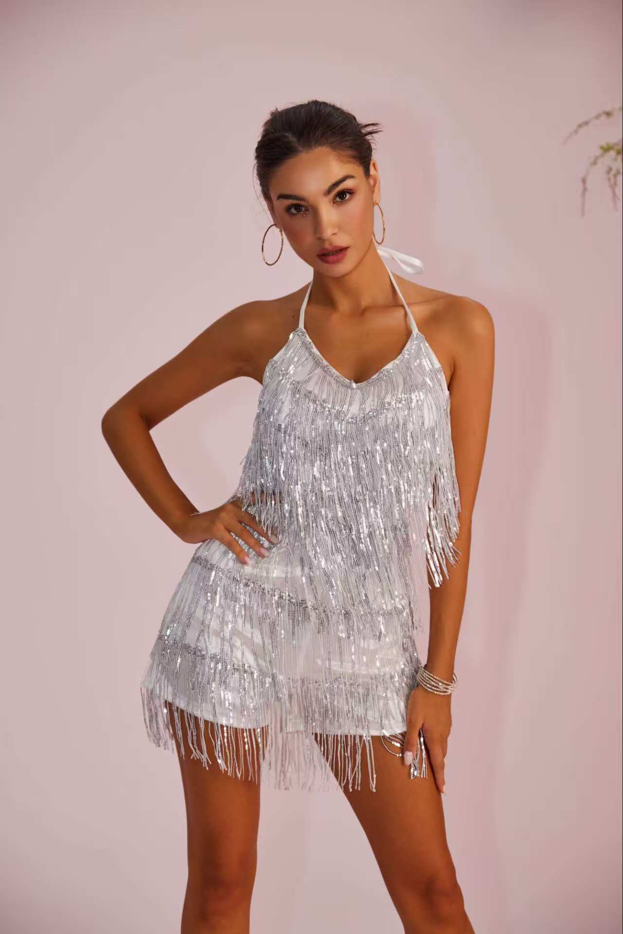 Dress with shimmering sequins and fringes