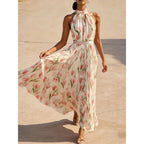 Flowy halter-neck wrap dress with floral print