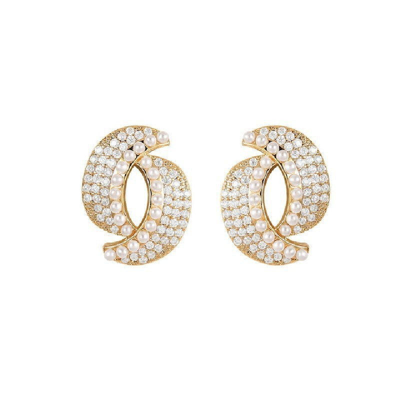 Boucles d'oreilles ornées de strass et de perle