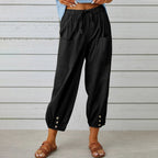 Pantalon noir ample pour femme avec poches avant, boutons décoratifs aux chevilles, style décontracté, idéal pour l'été.