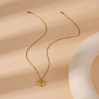 Collier pendentif cœur damier en acier inoxydable